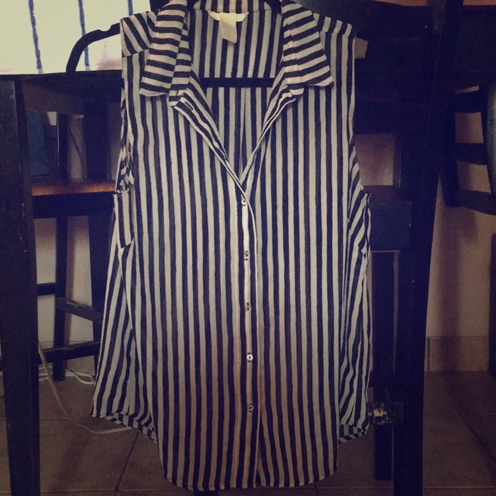 Sleeveless striped button down top.